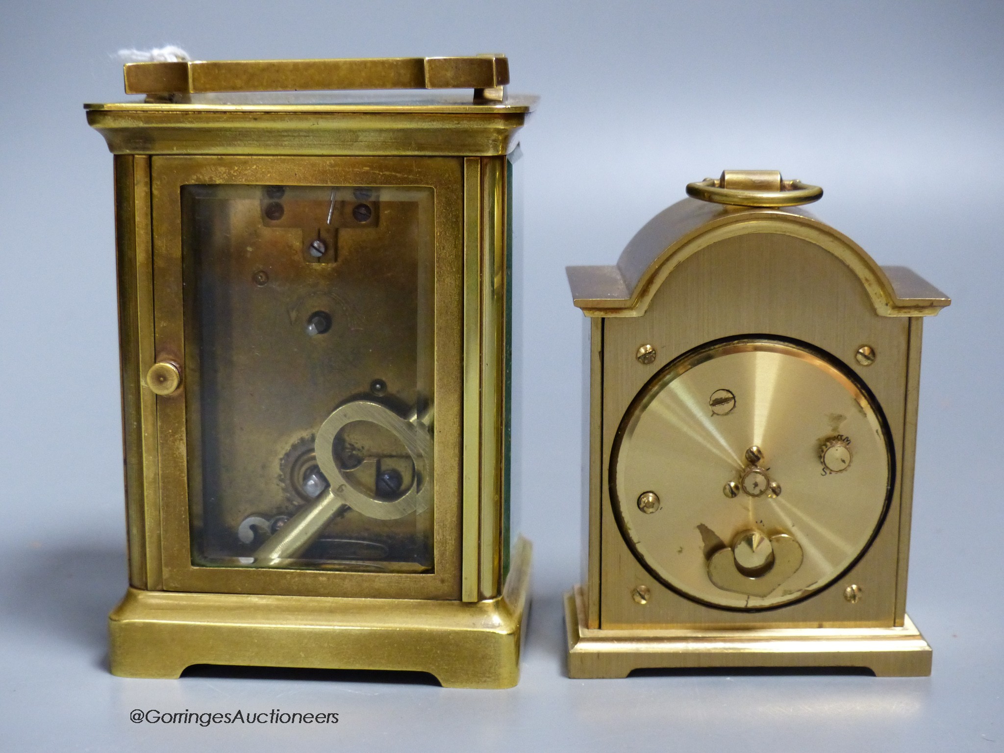 A brass carriage timepiece, 10.5cm and a carriage clock